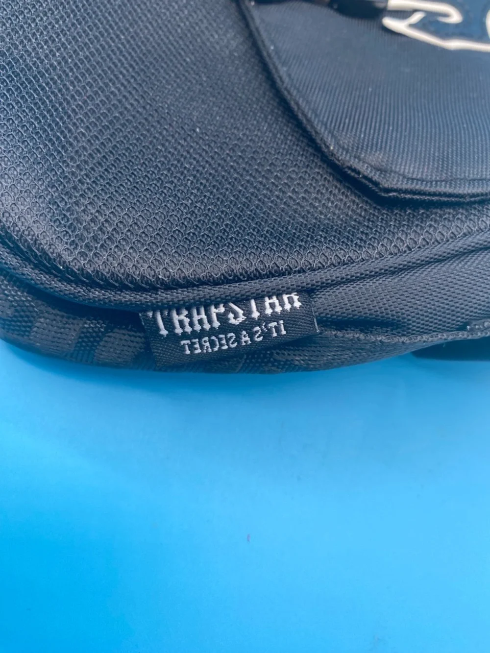 Trapstar Black Messenger Bag with Decorative Cross Buckle